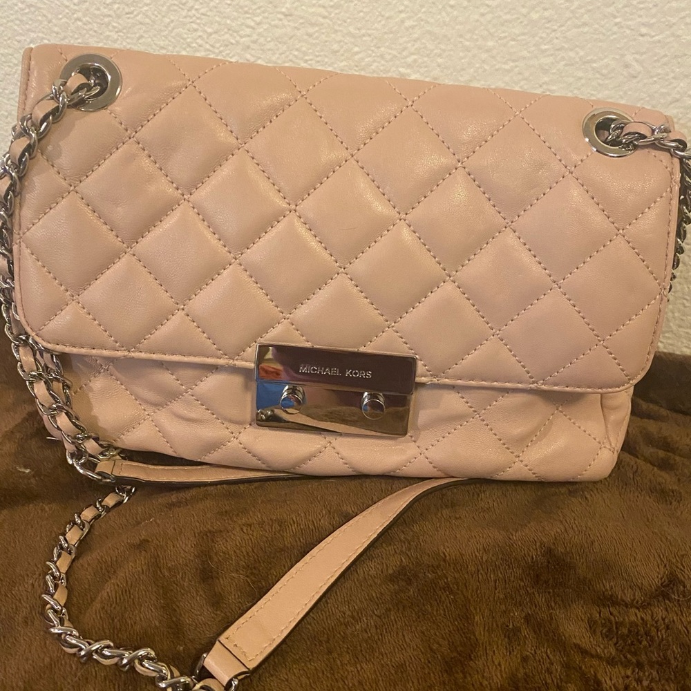 Michael Kors blush colored envelopes bag